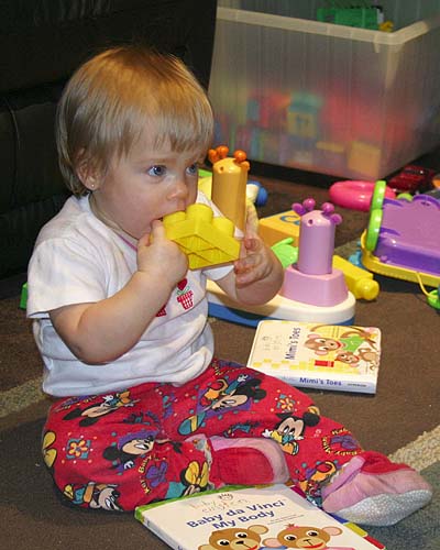 Chewing on Daddy\'s Mega Blocks