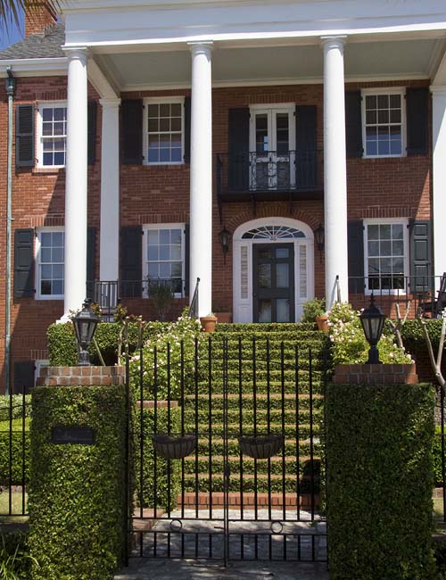 Portico with Green Staircase & Fence Posts