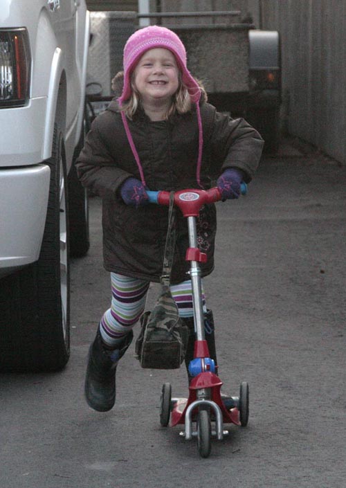 Scootering on the Driveway
