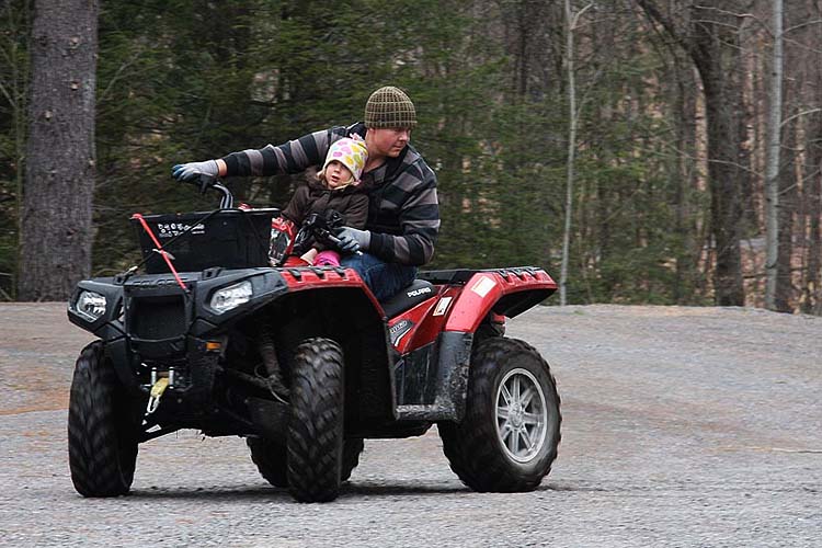 Riding an ATV with Daddy