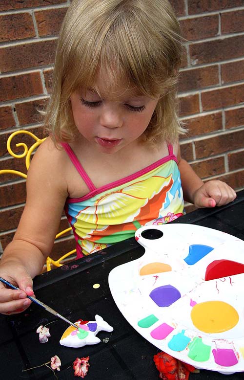 Teagan Paints a Plaster Fish