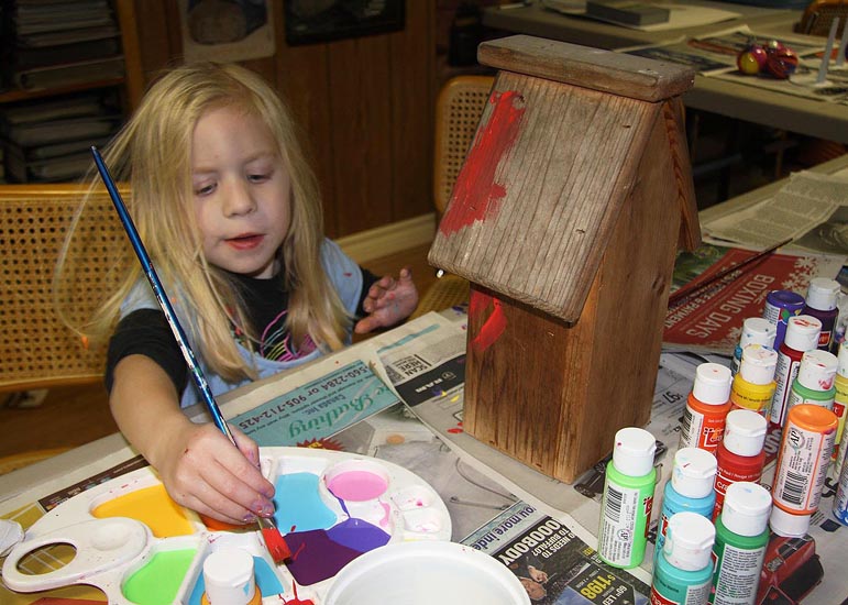 Natalya Painting a Birdhouse