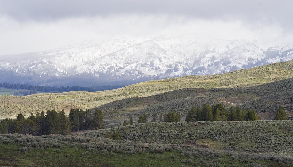 Snowing Over Distant Mountains