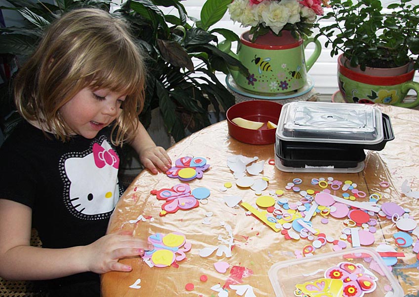 Teagan Making Foamie Butterflies