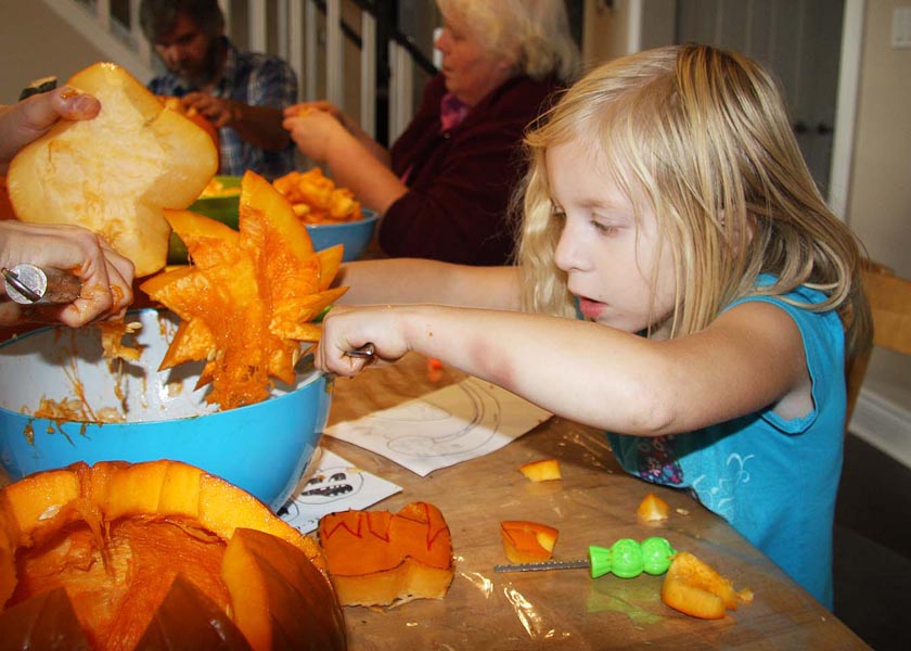 Natalya Cleaning the Insides of Her Pumpkin