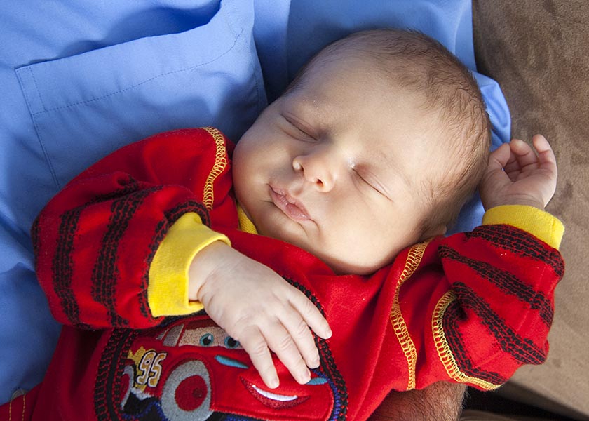 Asleep in Grandpa's Arms
