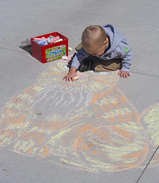 Little Artist Drawing a 'Kit Kat'