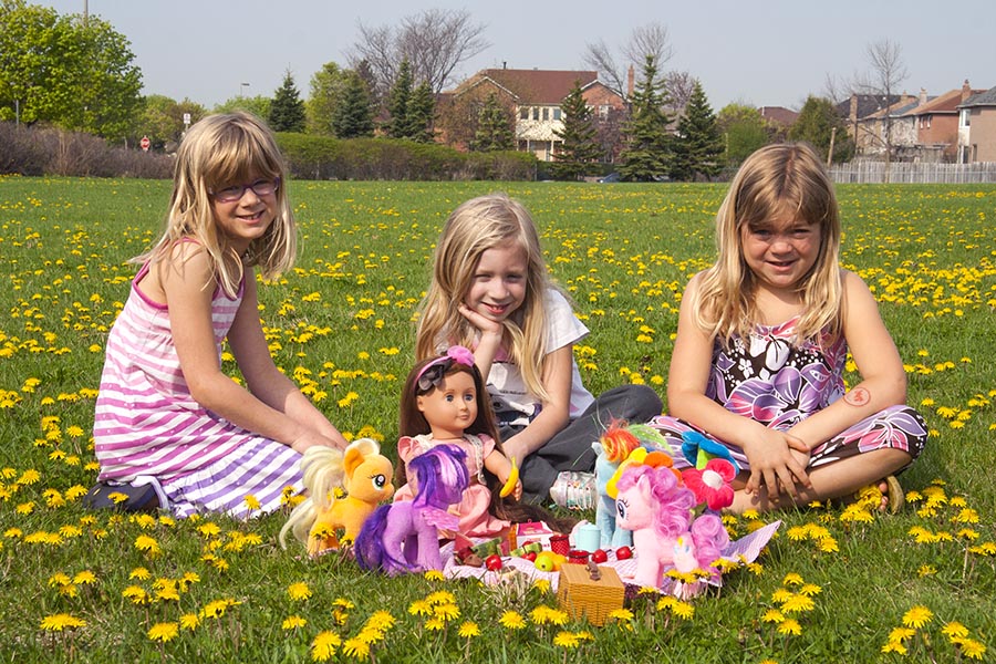 Granddaughters in the Dandelions