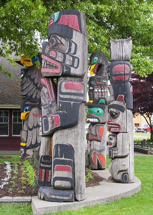 Group of Totem Poles on South Side of Station