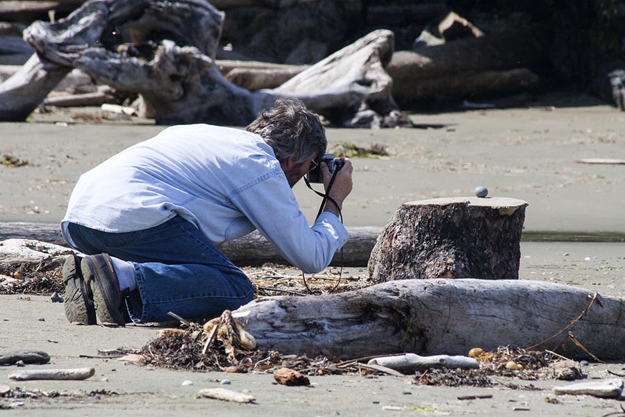 Photographing His Pet Rock