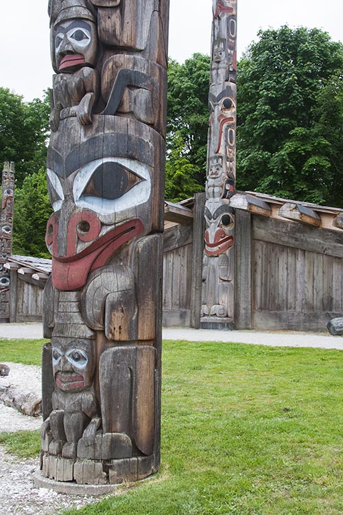 Closer look at Haida Mortuary Pole and Long House