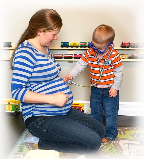 Dr. Elliot Checking up on His Little Sister