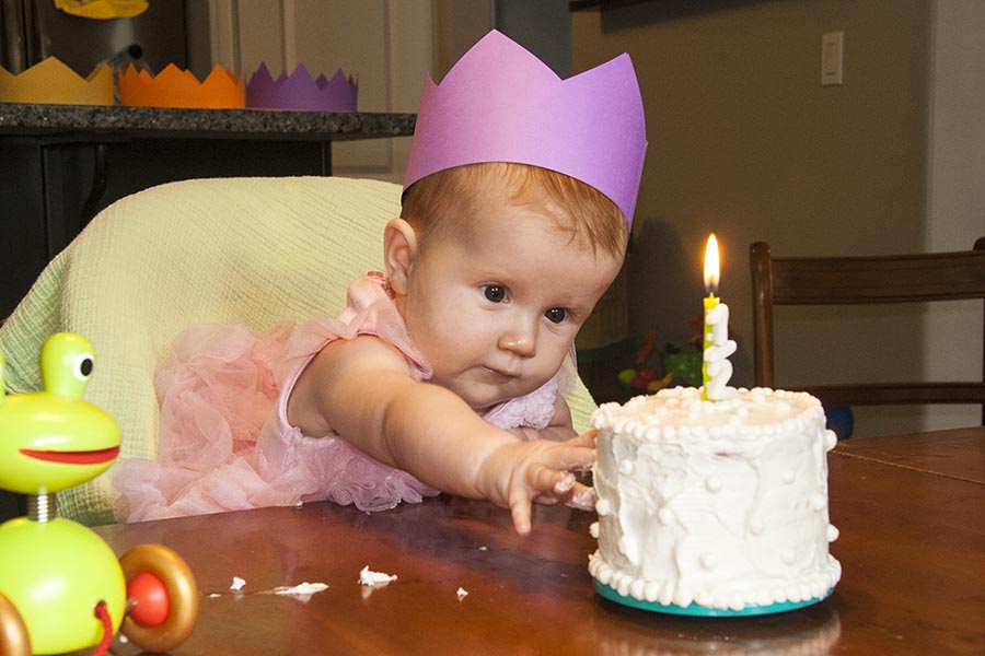 Reaching for her Cake
