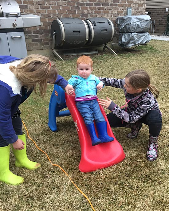 Helping Emily down the Slide