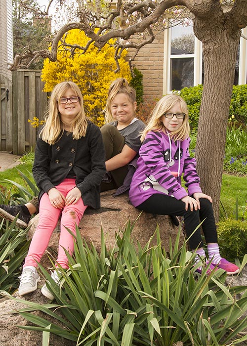 Three Girls on a Rock