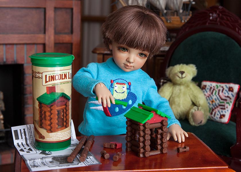 Building with Lincoln logs on Lincoln's Birthday