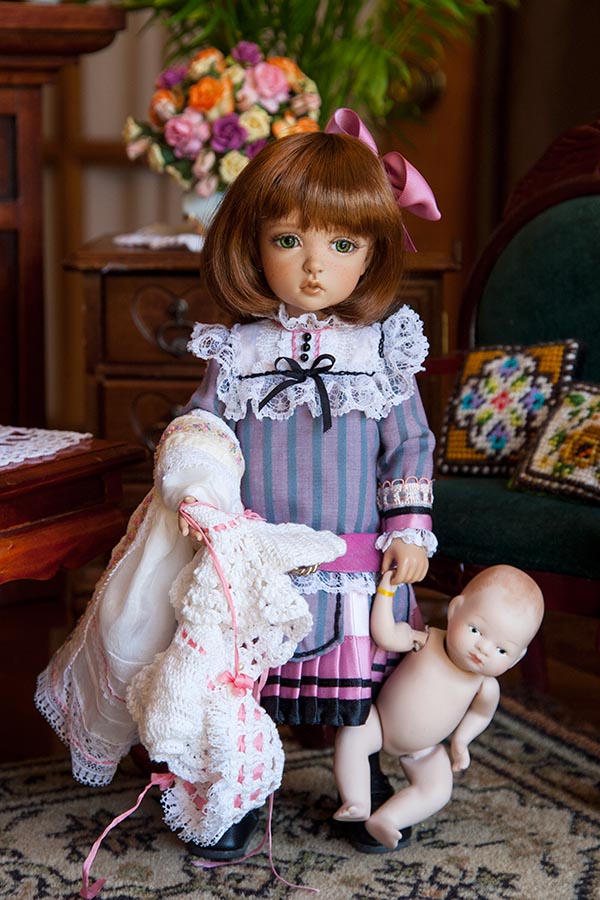 Nyssa Comes In with Her Doll Clothes