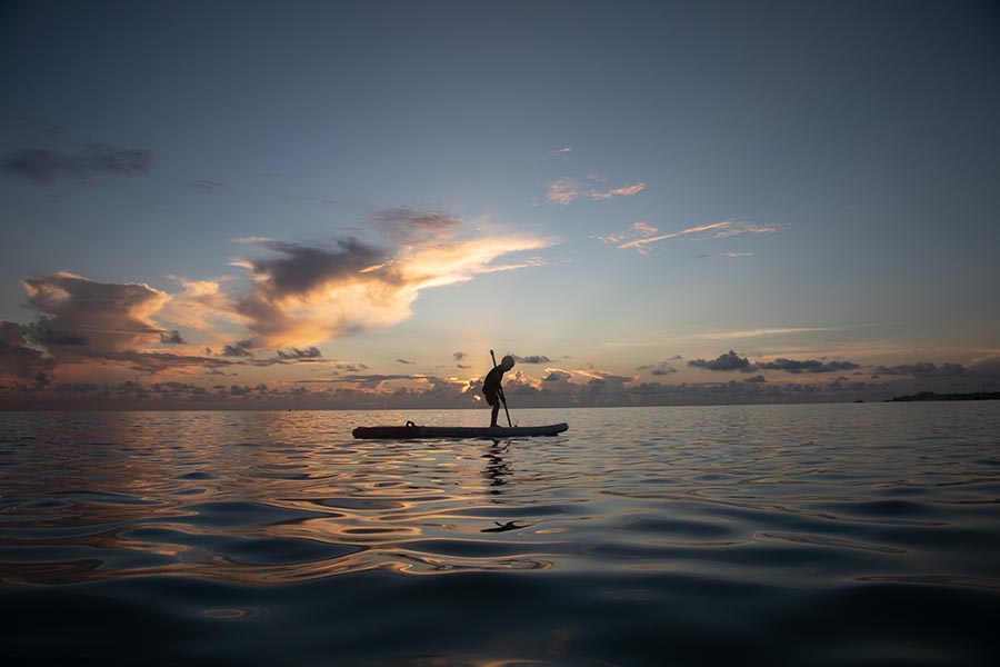 Elliot Paddling Into the Sunset