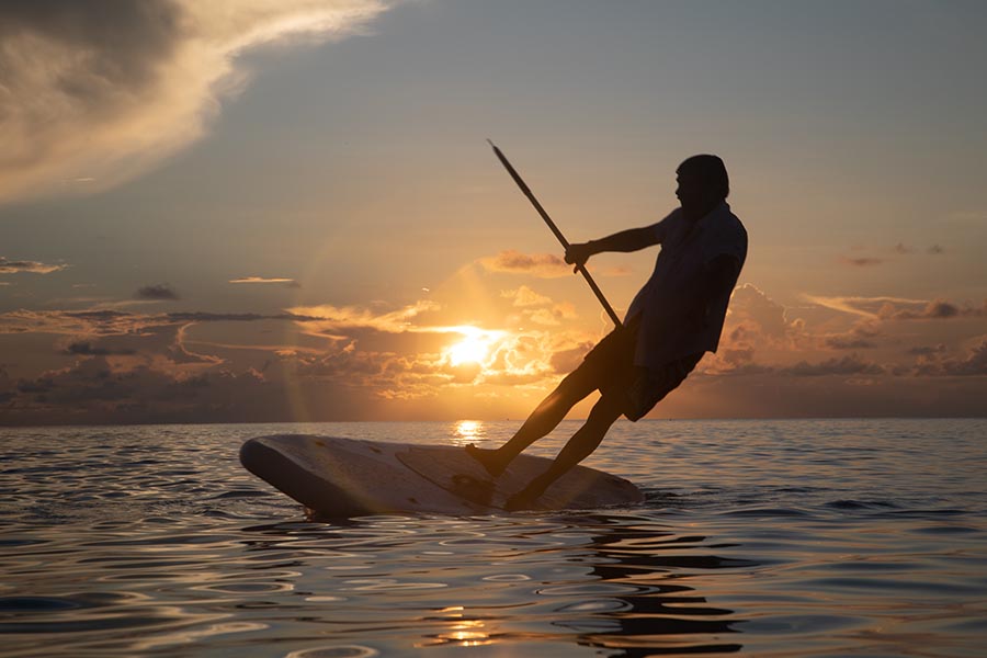 Grandpa Trying to Paddle Board