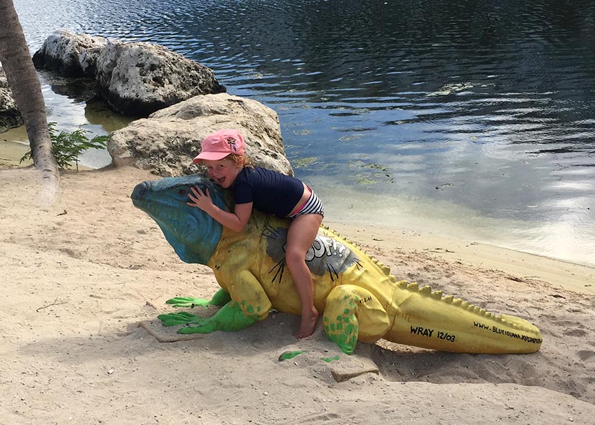 Emily on an Iguana