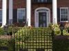 Portico with Green Staircase & Fence Posts