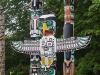 Thunderbird House Post and Three Totem Poles