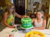 Decorating a Cake for their Mom's Birthday