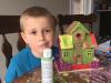 Elliot and his Painted Bird House